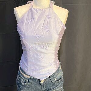 Woman’s lavender sleeveless dressy top